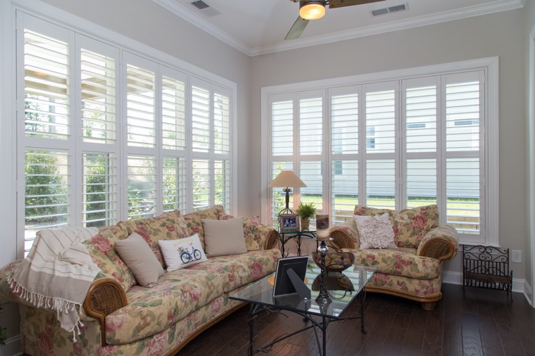 Sunroom with plantation shutters in Gainesville.